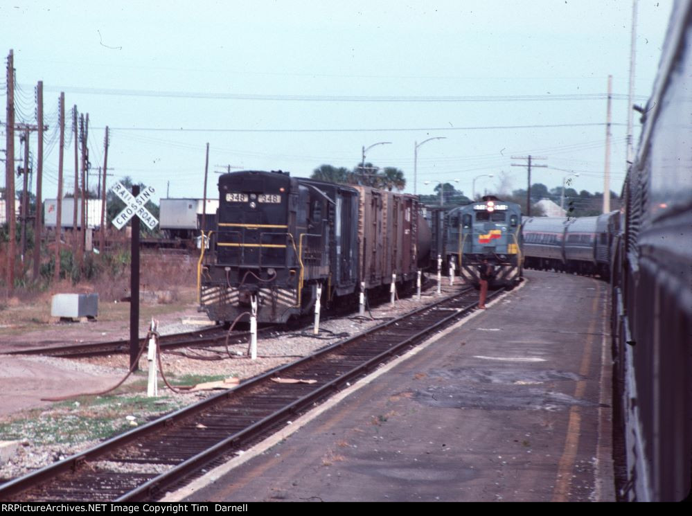 SCL 348, SBD 5116 on a trailer train